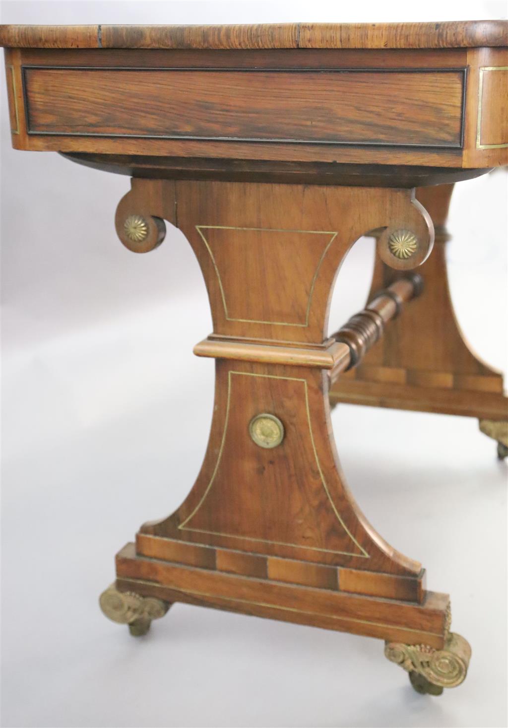 A Regency brass strung rosewood games table, W.3ft D.1ft 9in. H.2ft 5in.